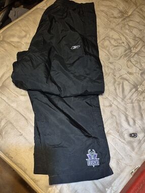 Reebok Black and White Mesh Lined Athletic Pants Bucks On Pant Leg
